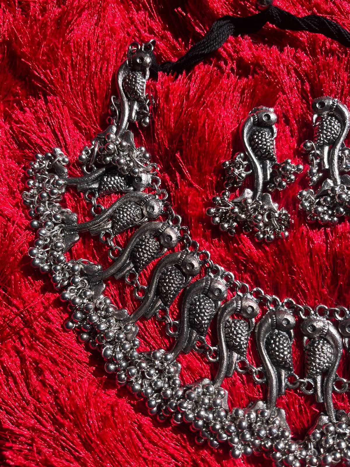 Silver plated Oxidised peacock chocker with earrings