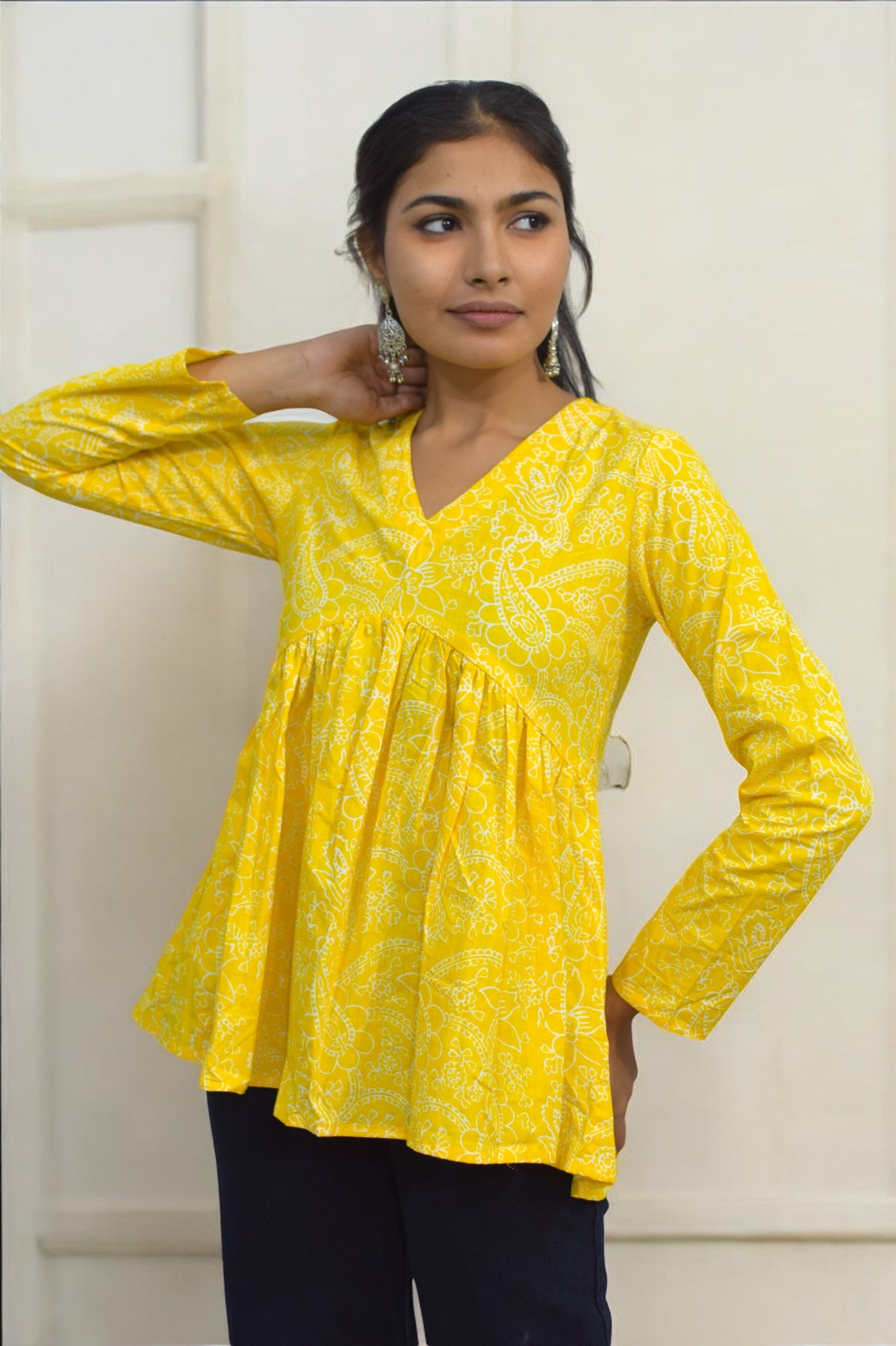 Yellow V - neck peplum top