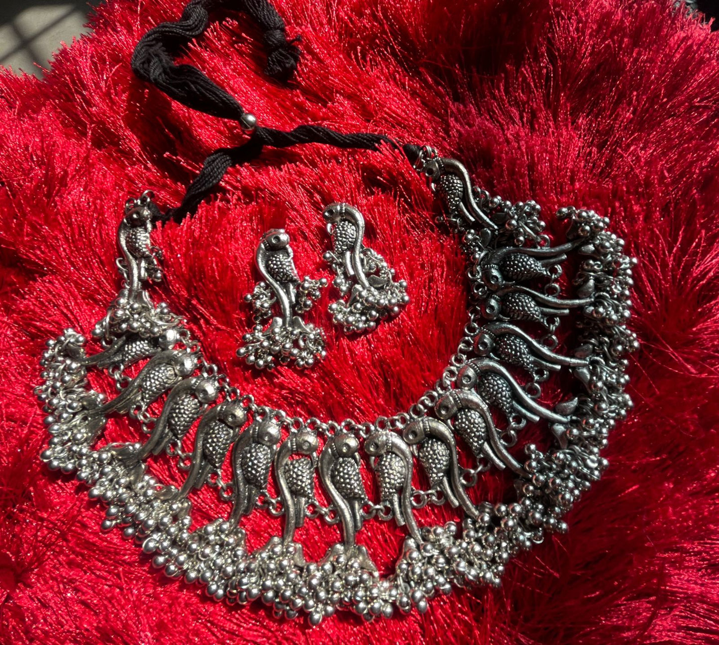 Silver plated Oxidised peacock chocker with earrings