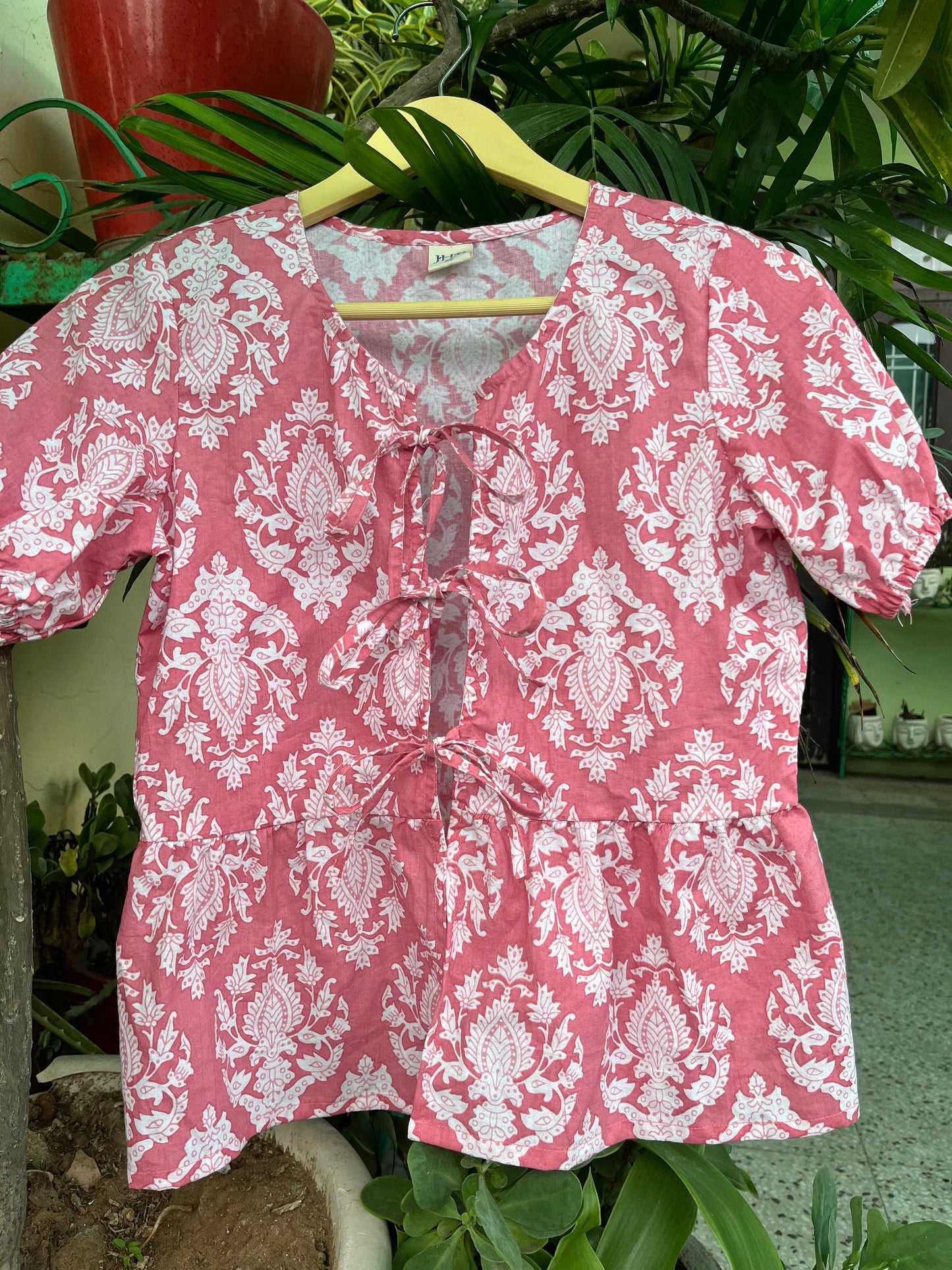 Pink taj cotton peplum Bow top